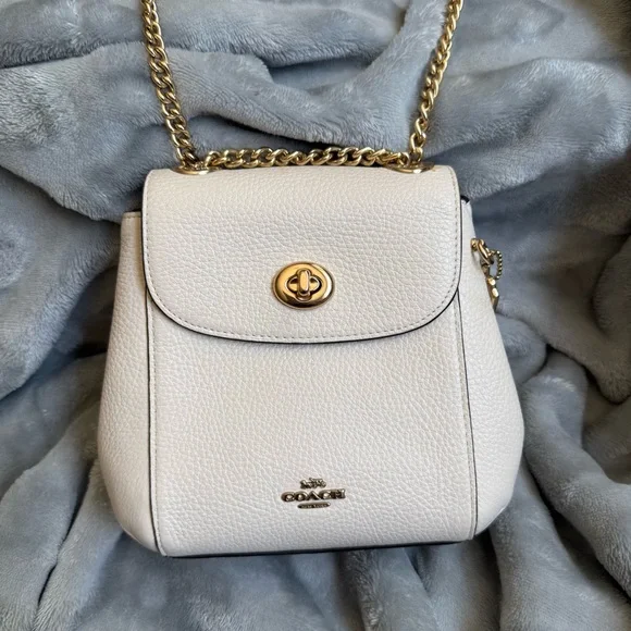 coach handbag backpack convertible Amelia Convertible Coach backpack in refined calf leather with a smooth naturally shiny finish and a structured silhouette Coach Amelia convertible backpack -
